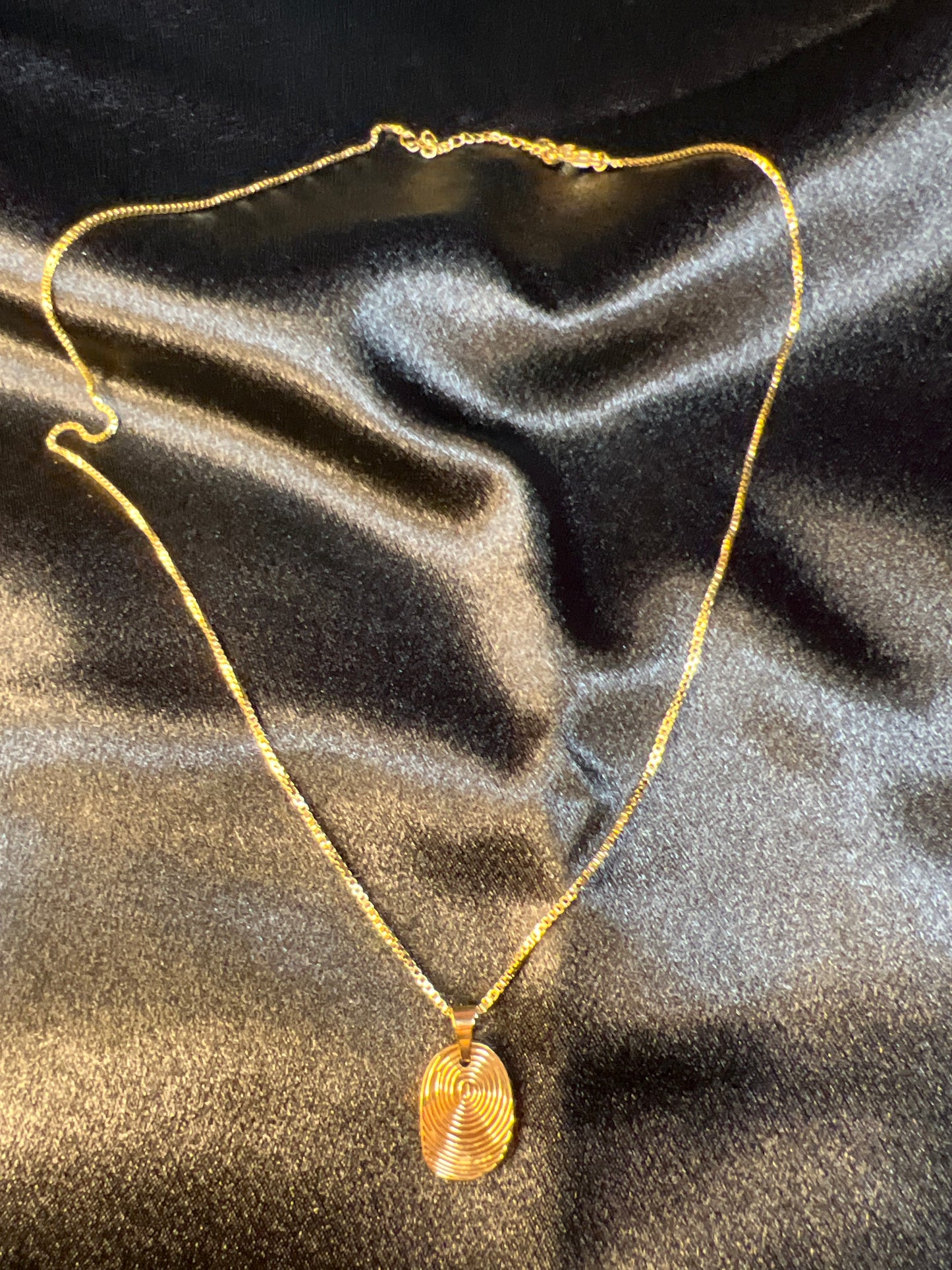 Gold "Life is Spiral" Necklace